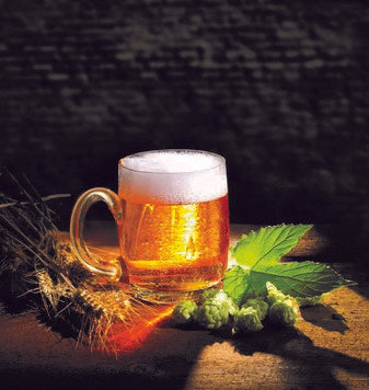 Glass mug of beer with hops and barley on a wooden table