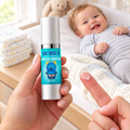 Parent holding Booty Soothe with one dot of gel on a fingertip at changing time